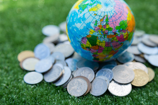 Photo of passport, money and world map.