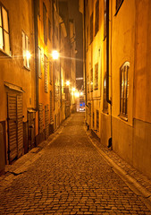 Narrow street at night in Stockholm