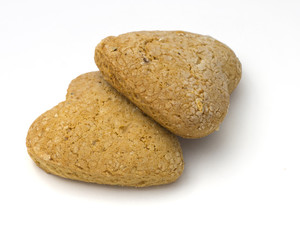 Fototapeta na wymiar homemade heart shaped gingerbread cookies isolated on white back