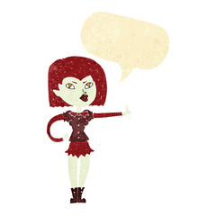cartoon vampire girl giving thumbs up with speech bubble