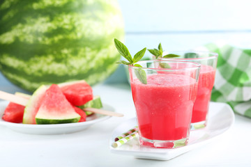 Fresh watermelon juice in the glass on wooden table