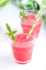 Fresh watermelon juice in the glass on wooden table