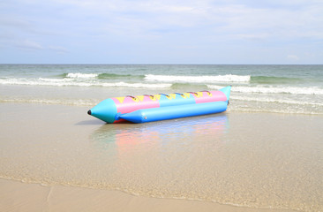 Fototapeta na wymiar Colorful rubber boats on the beach