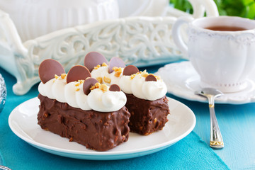 Chocolate cake with caramel, peanut cream 