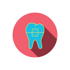 Dental braces icon. Tooth healthcare sign.