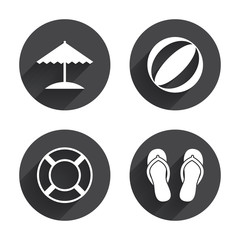 Beach holidays icons. Umbrella and sandals.