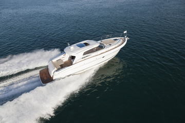Beautiful yacht flying over the surface of the ocean
