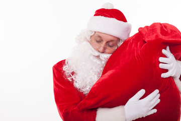 Old Father Christmas is sleeping with bag