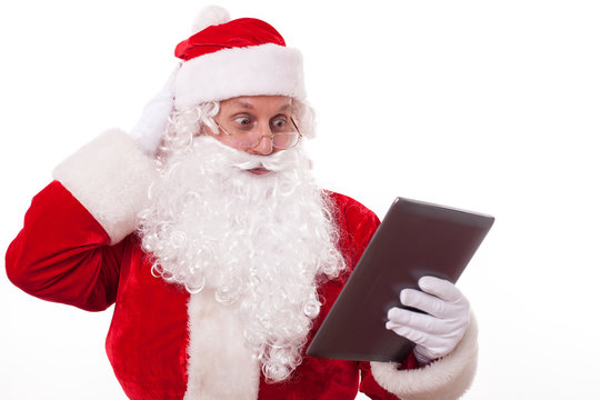Gorgeous Santa Claus is acknowledging with modern technology