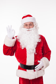 Gorgeous old Father Christmas is gesturing positively