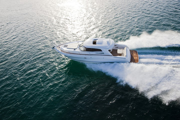 Luxurious boat racing through the ocean