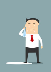 Crying businessman standing in a pool