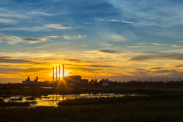 Fototapeta premium Power plant during sunset