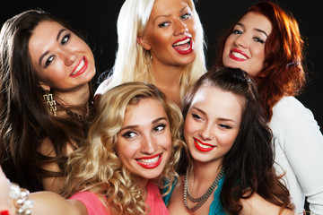 Fototapeta premium Close-up shot of group of laughing girls having party