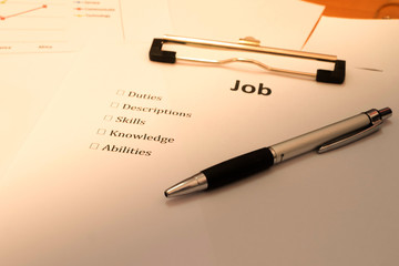 Interview job white paper with pen