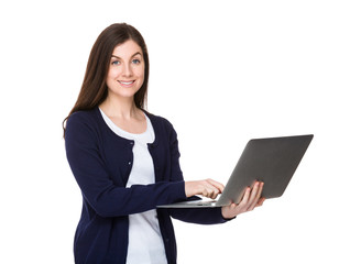 Young woman use of the laptop computer