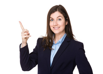 Brunette businesswoman with finger point up