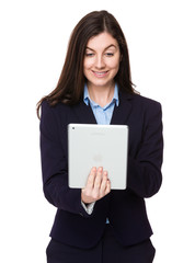 Brunette young businesswoman use of the tablet pc