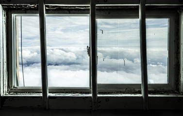 Fototapeta premium Window Above Clouds