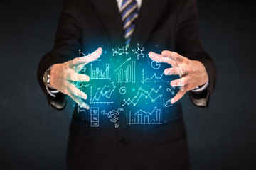 holding hand drawn business diagrams