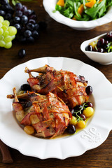 Baked stuffed quail with grape sauce.