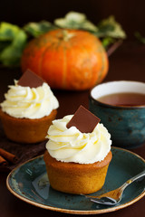 Pumpkin muffins with cream.