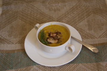 zucchini soup with bacon and greenery