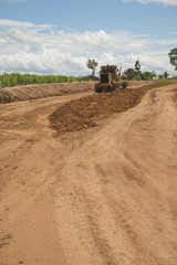 Bulldozer machine during construction road works