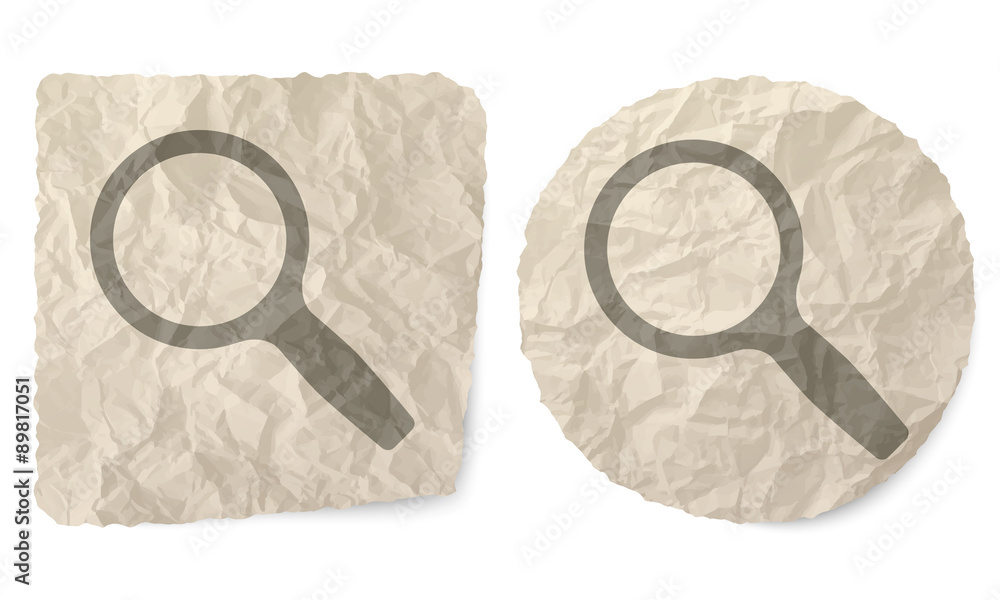 Poster crumpled slip of paper and a magniifier