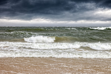 Dark clouds in the winter sky during a storm at sea.