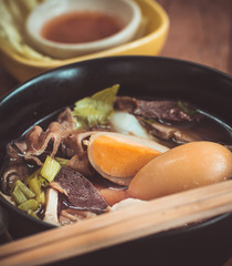 Crunchy Pork Soup ( kuay jap ) or boiled Chinese pasta square