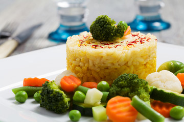 Portion of risotto with vegetables.