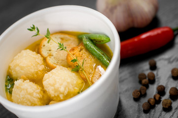 Delicious portion of cream soup with crackers