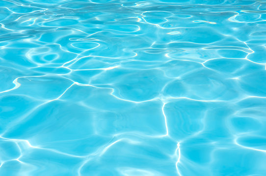 Blue water surface in swimming pool