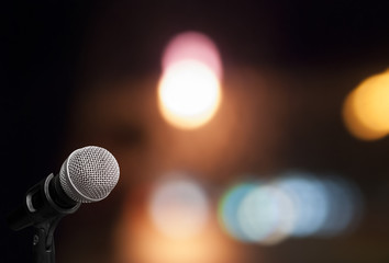 Fototapeta na wymiar Microphone on stage background