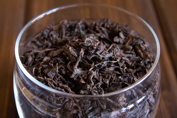 Black dry tea leaves