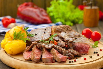 Grilled beef steak with mushroom sauce