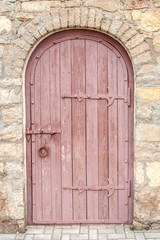 Fototapeta na wymiar Closed ancient wooden door