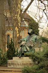 Statue of Anonymus in Budapest's City Park  in the courtyard of Vajdahunyad Castle