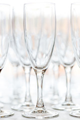 Glasses for drinks and cocktails at the festive table. toned