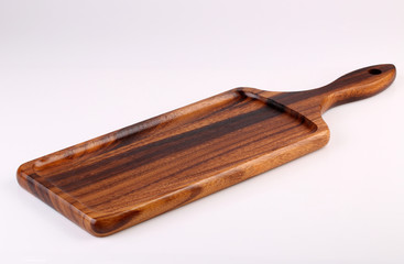 Dark brown wooden tray isolated with white background