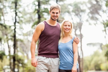Obraz premium Young happy joggers looking at the camera