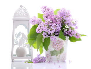 Fototapeta premium Lilac flowers decoration on a white background