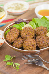 Falafel - Middle Eastern deep fried balls made of chickpeas.
