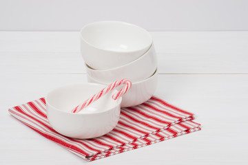 Christmas Candy Cane. White Bowls. Red White Napkin