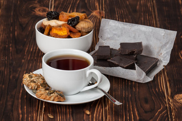 Autumn Concept. Cup Of Tea Or Coffee. Dried Fruits. Dark Chocola