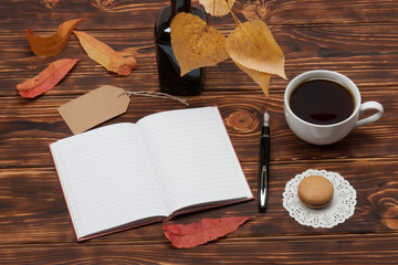Open Notepad. Cup Of Cofee. Macaroon Cookies. Wooden Background