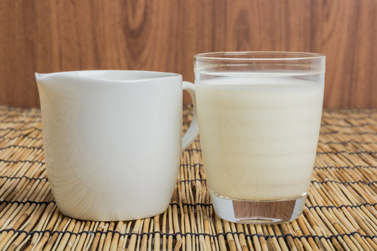 Cow milk and ceramic jug