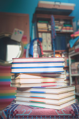 Colorful books in the blue room.