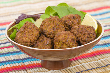 Falafel - Middle Eastern deep fried balls made of chickpeas.
